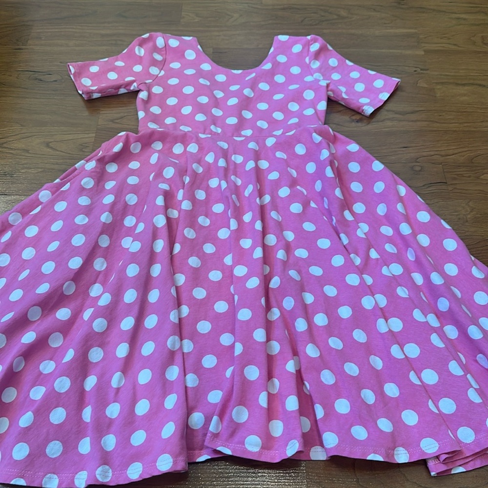 Remie Girl twirl pocket dress in size 8.
